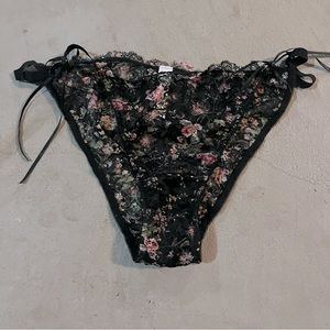 Lacy black and floral panties with tie bows on the sides